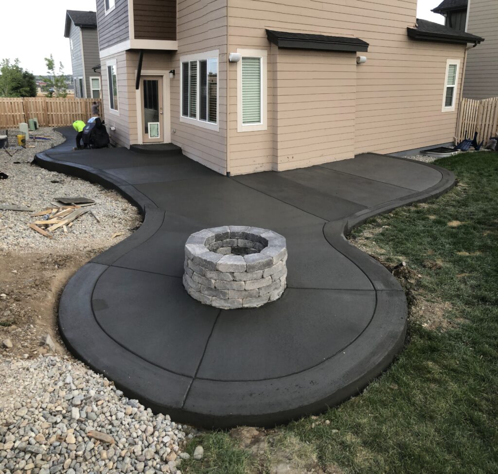 Concrete patio with a fire pit